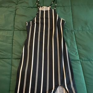 Long body con dress, only worn once, with slit down one side of the leg.